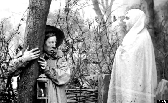 Victorian photograph of ghost and frightened man. Circa 1865.